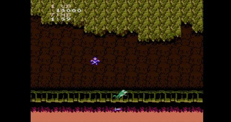 Arthur chiến đấu với quái vật hình dơi trong hầm mộ Ghosts n Goblins