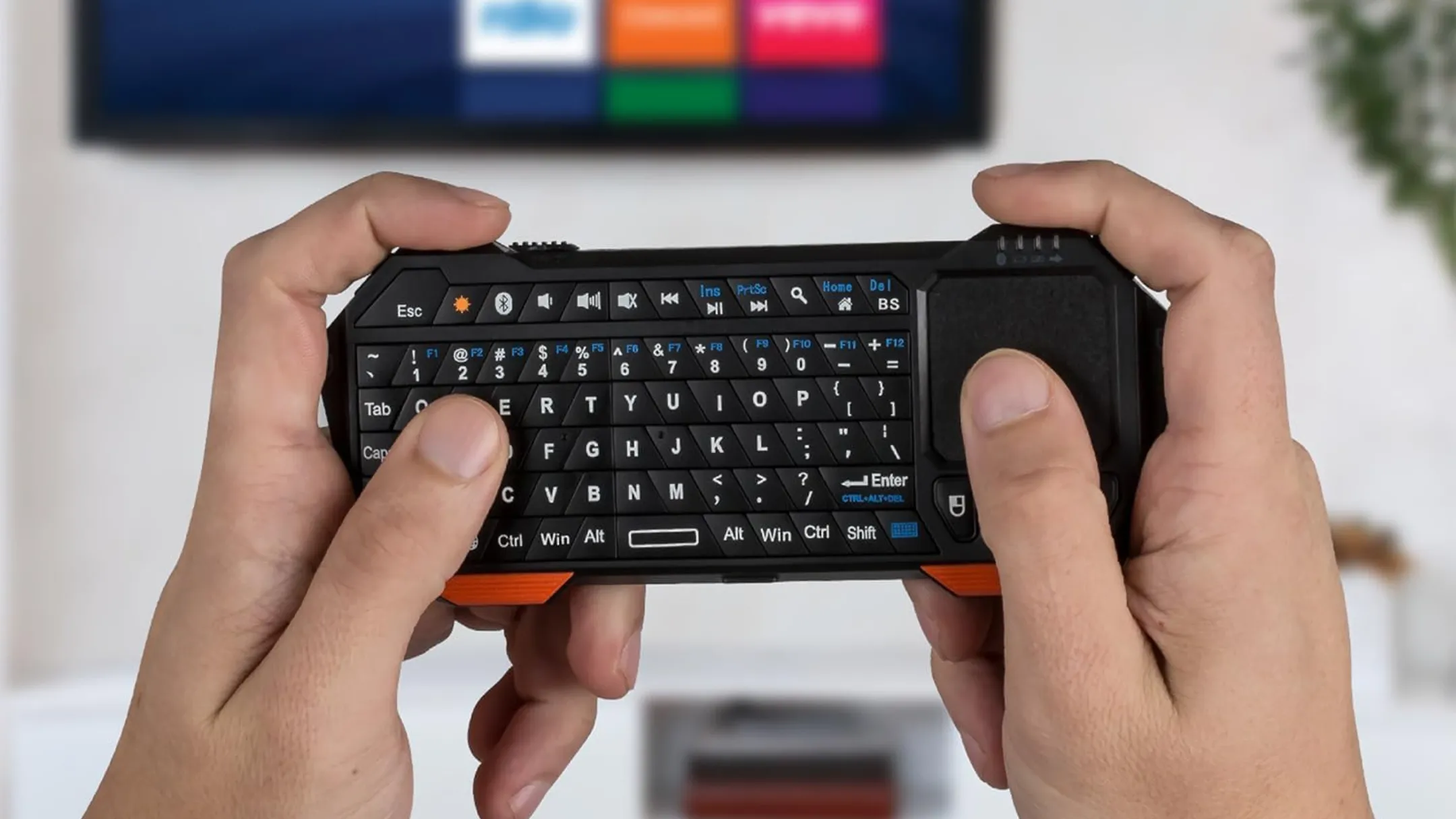 Bàn phím mini Fosmon với đèn nền rực rỡ và touchpad nhạy bén