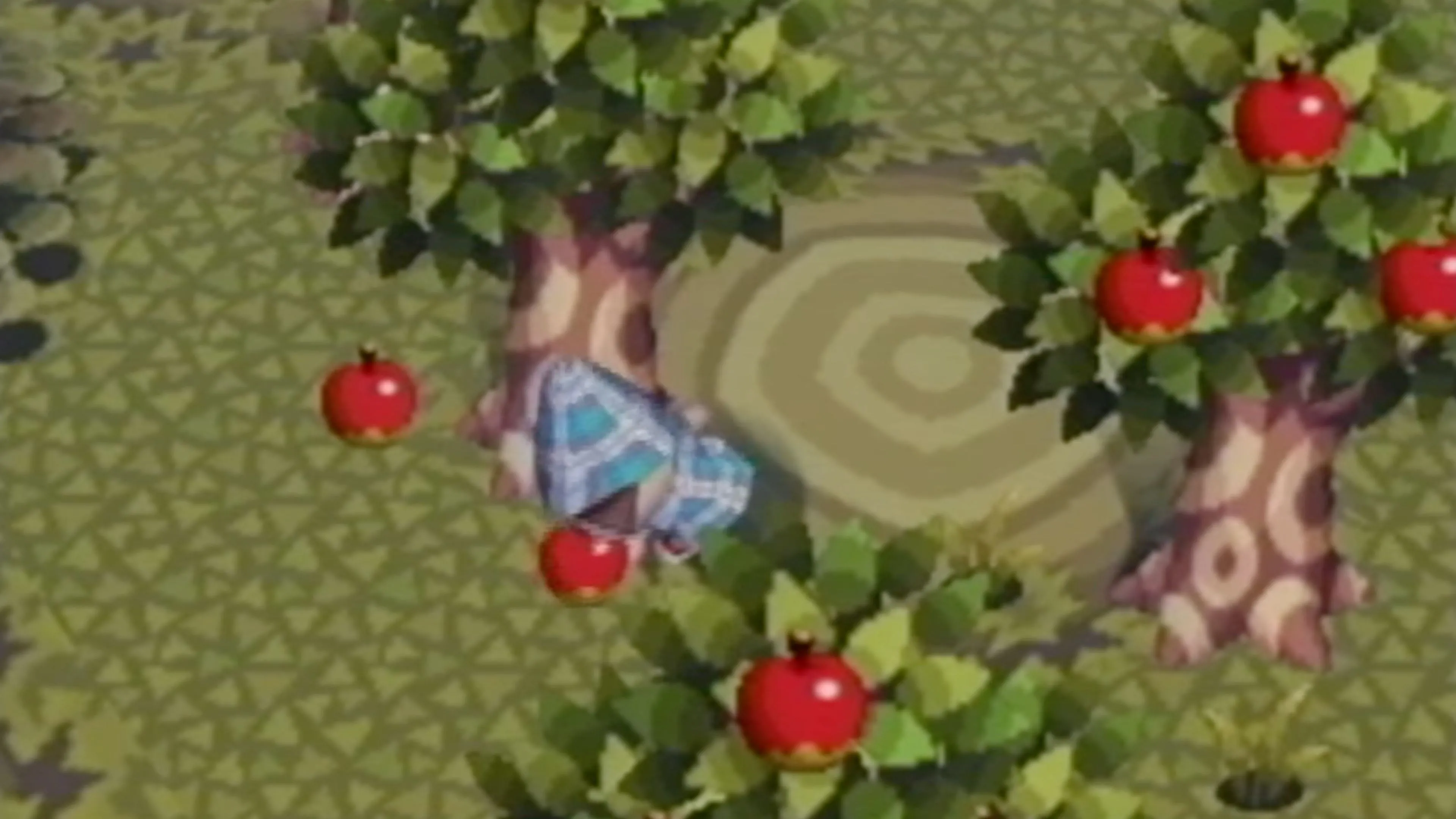Cảnh thu hoạch táo trong Animal Crossing, một hoạt động giải trí trên GameCube.