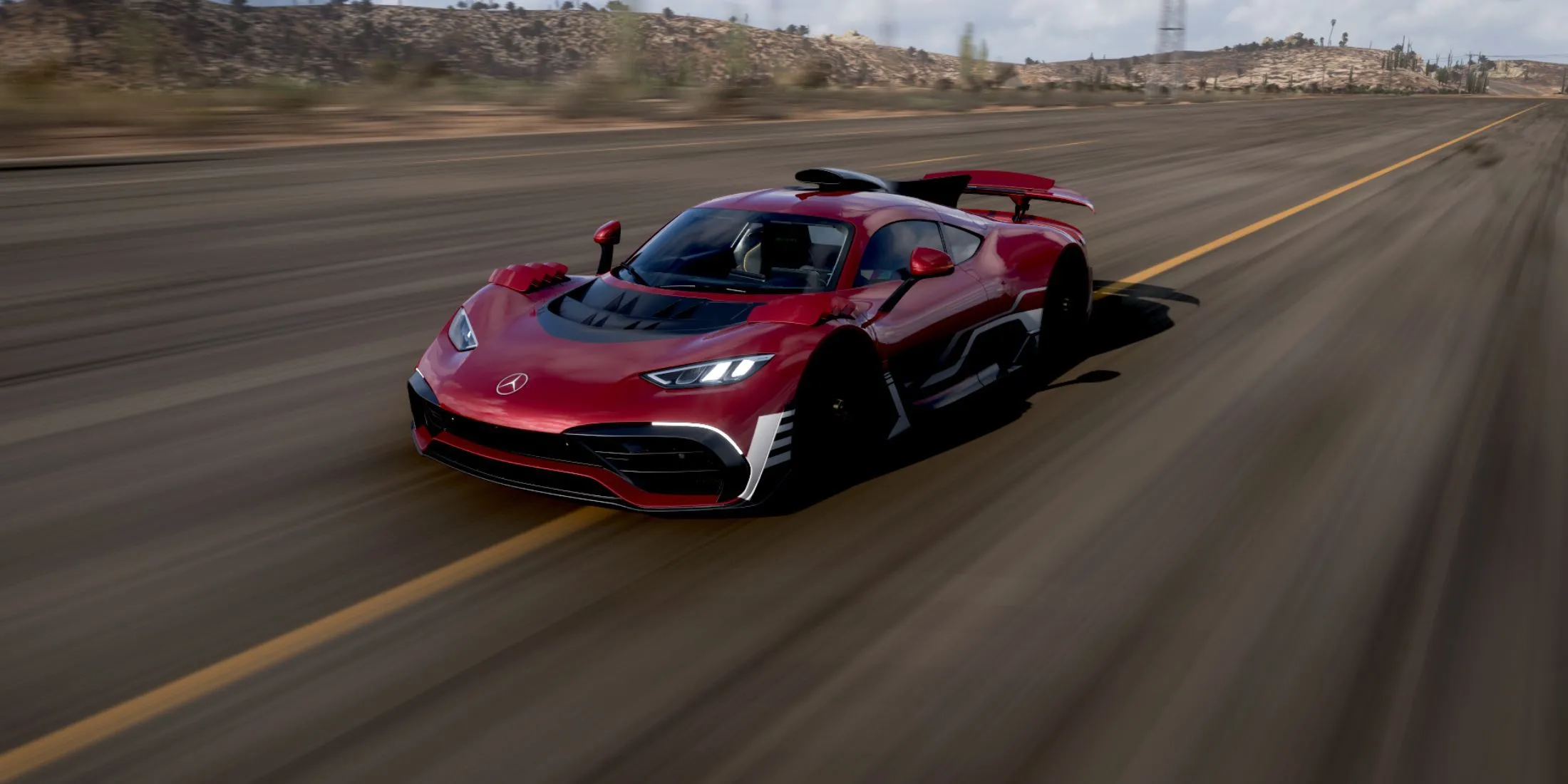 Chiếc Mercedes-AMG ONE tốc độ cao trên đường, thể hiện đồ họa chân thực và dàn xe đỉnh cao của Forza Horizon 5.