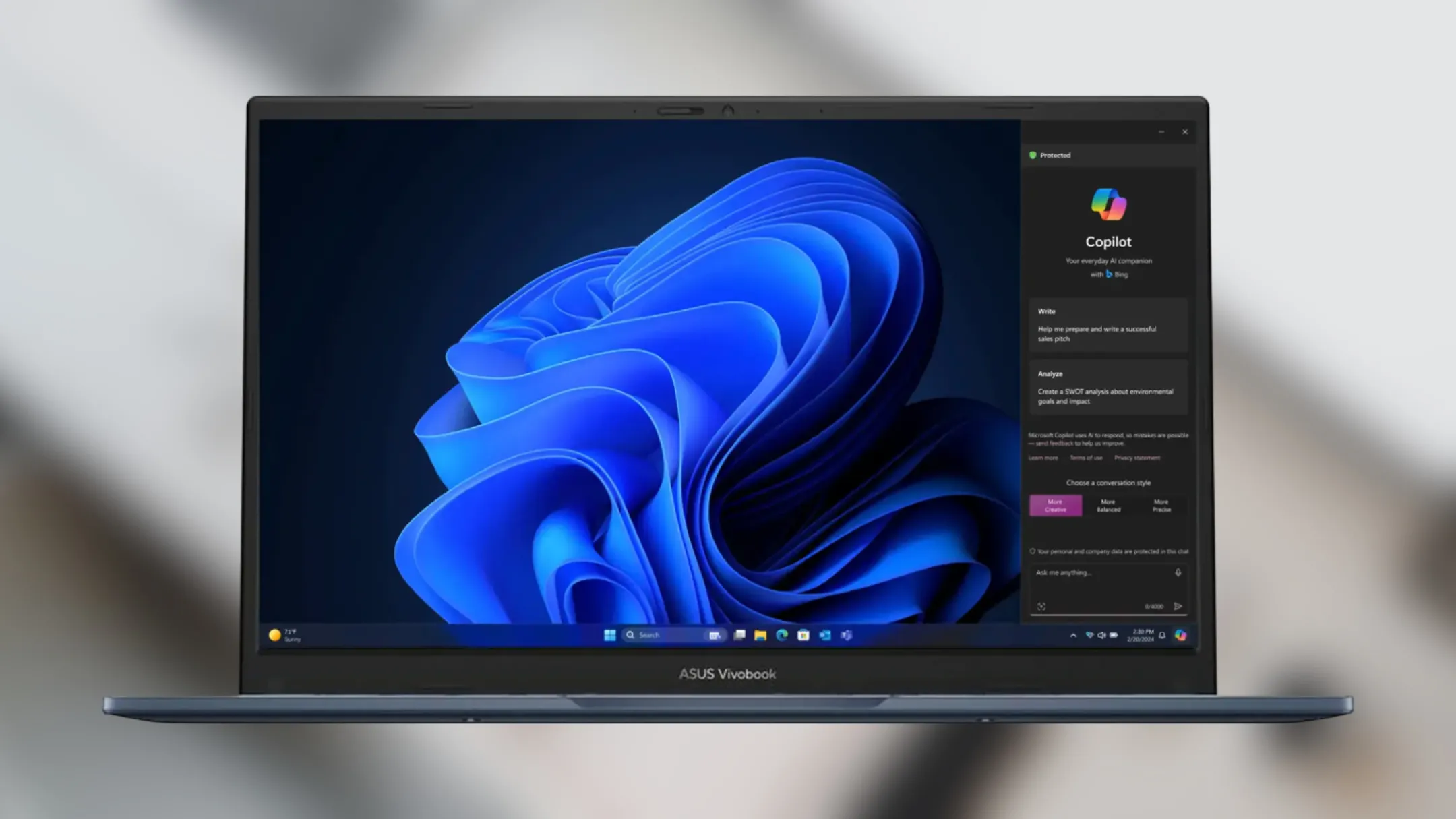 Hình ảnh cận cảnh màn hình và bàn phím của Asus Vivobook 14, hiển thị trải nghiệm người dùng