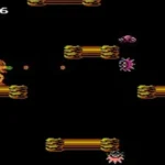 Hình ảnh lối chơi từ tựa game Metroid gốc trên NES với đồ họa 8-bit và Samus Aran