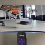 Hình ảnh Roombavision với Roomba đang di chuyển trước gương, minh họa việc điều khiển robot hút bụi bằng Raspberry Pi 4 qua internet