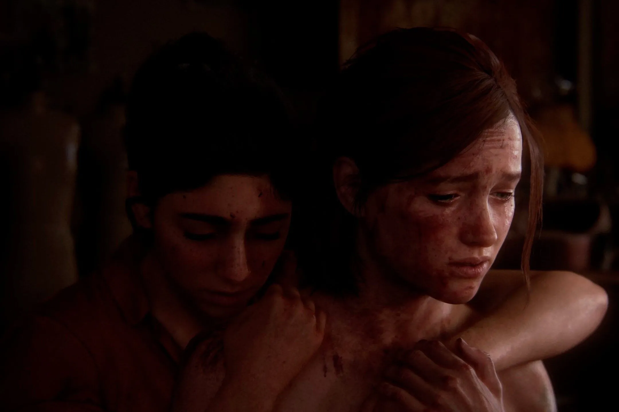 Khoảnh khắc Ellie và Dina ôm nhau, thể hiện mối quan hệ sâu sắc của họ trong The Last of Us Part II.