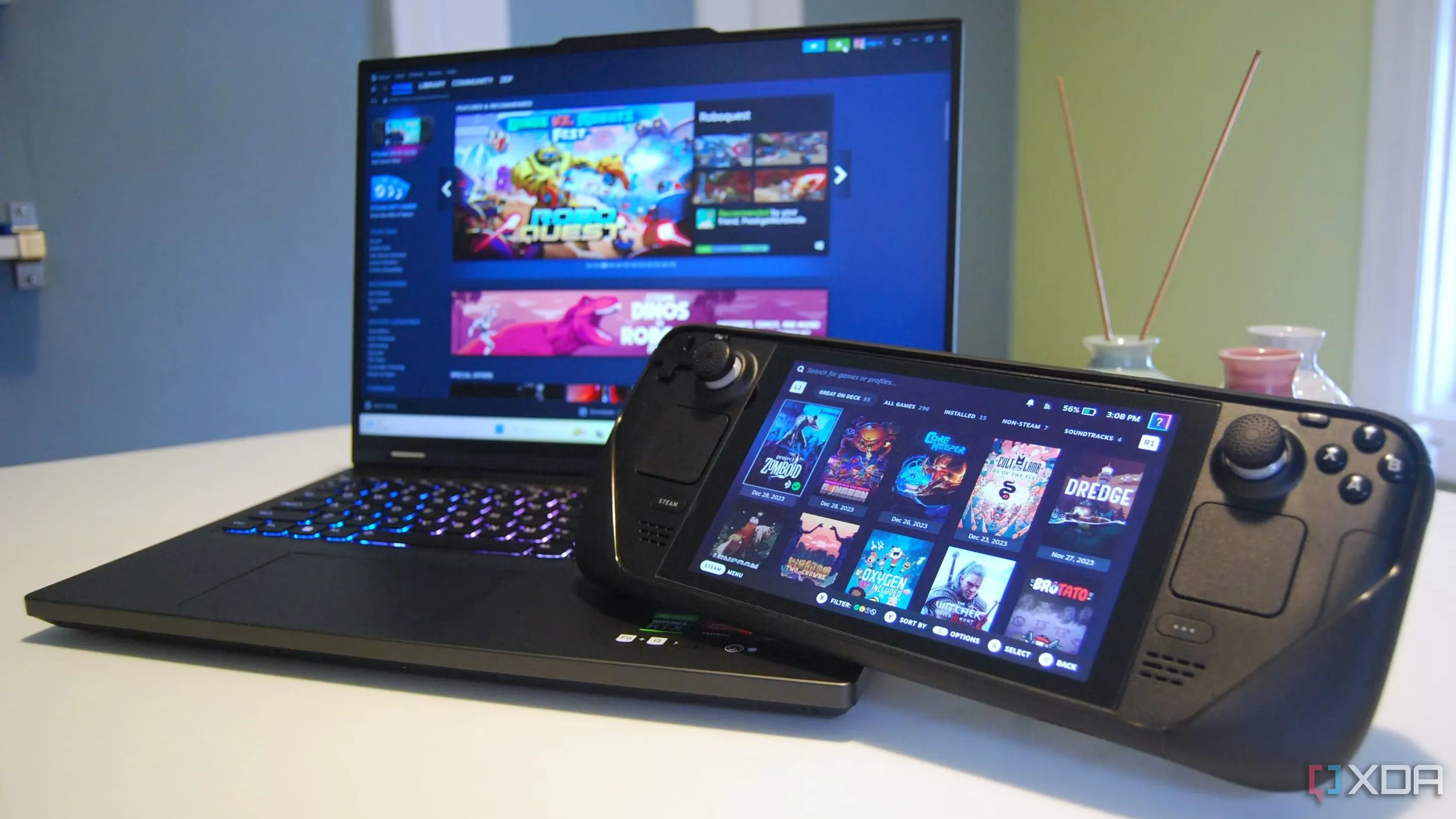 Laptop và Steam Deck hiển thị giao diện Steam, minh họa sự đa dạng của nền tảng game và rủi ro bảo mật thông tin tài khoản.