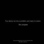 Màn hình BSOD màu đen mới trên Windows 11 24H2, thể hiện giao diện lỗi khởi động lại được cải tiến.