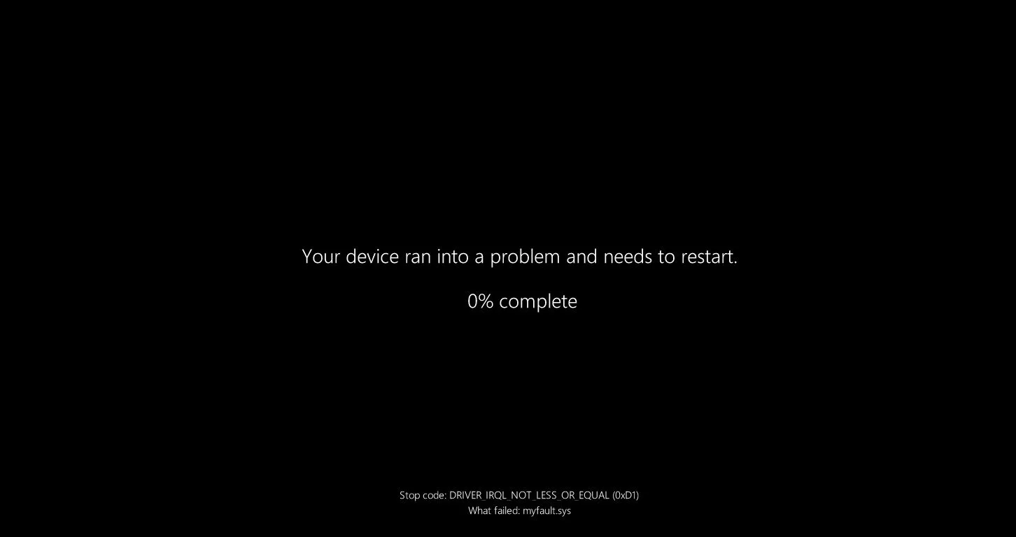Màn hình BSOD màu đen mới trên Windows 11 24H2, thể hiện giao diện lỗi khởi động lại được cải tiến.
