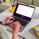 Máy tính MacBook hiển thị ứng dụng lịch, thể hiện sự ưu tiên cho công việc và người dùng phổ thông thay vì game thủ chuyên nghiệp.