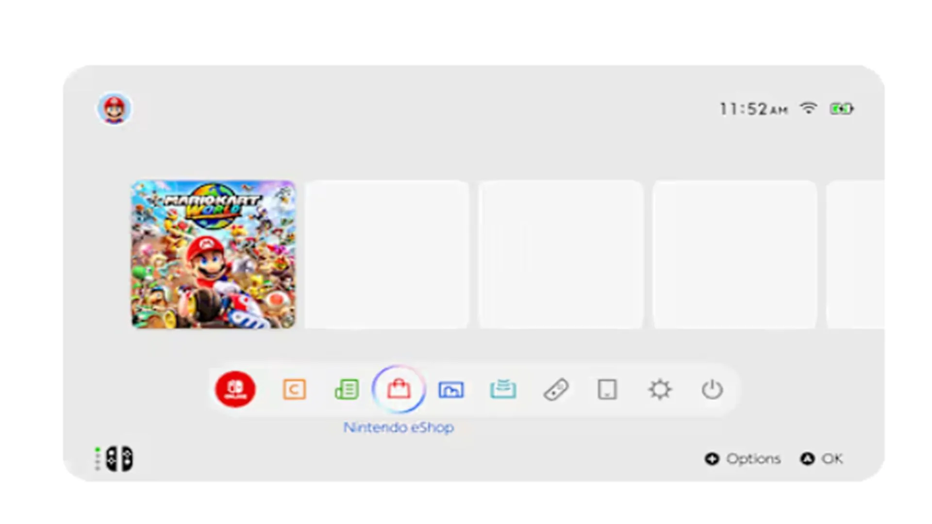 Mô tả ảnh: Ảnh chụp màn hình giao diện chính (home screen) của Nintendo Switch 2, với nền trắng và các ô game hình vuông, thể hiện sự tương đồng với UI của Switch đời đầu.