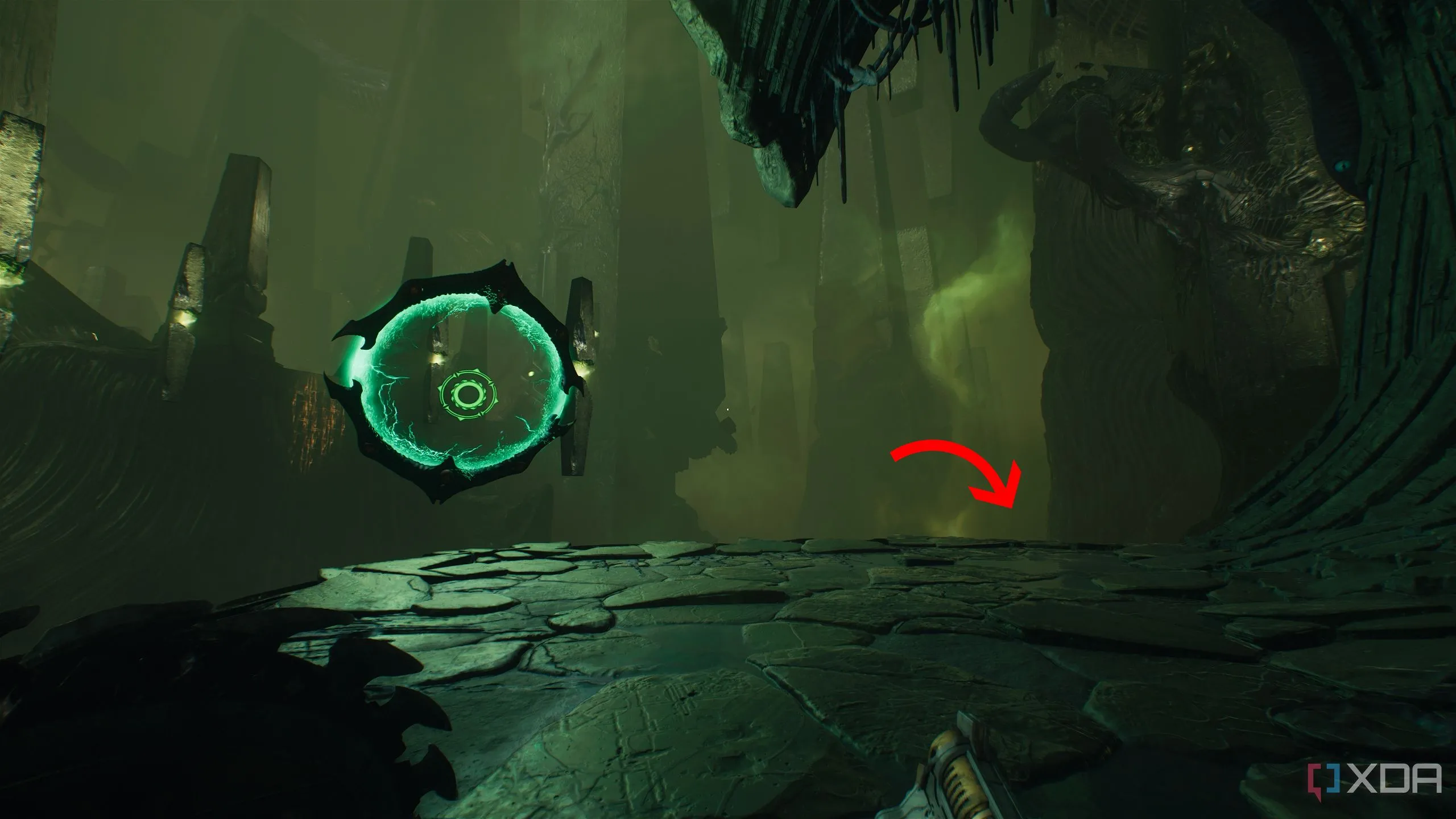 Mũi tên chỉ xuống bên phải cổng Shield Portal trong Chapter 15