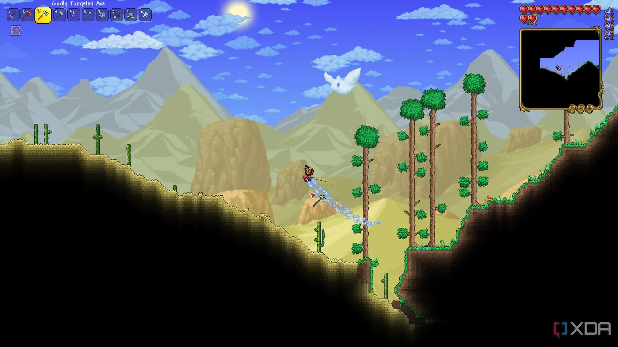 Nhân vật người chơi đang khám phá một khu vực sa mạc trong Terraria.