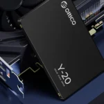 Ổ cứng SSD Orico 4TB 2.5 inch đặt cạnh card đồ họa, minh họa kích thước và khả năng nâng cấp