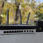Tổng quan các thiết bị mạng bao gồm router TP-Link, SBC Radxa X4 và switch mạng Zyxel minh họa việc nâng cấp hệ thống